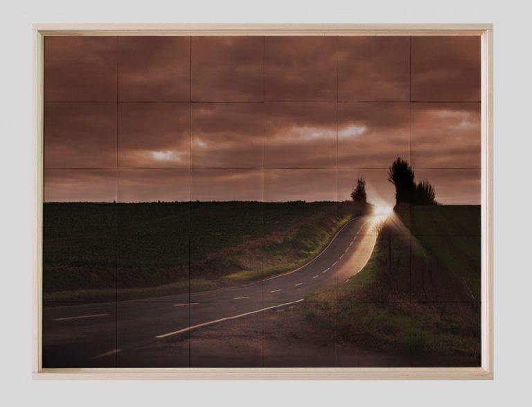 car-driving-down-hill
