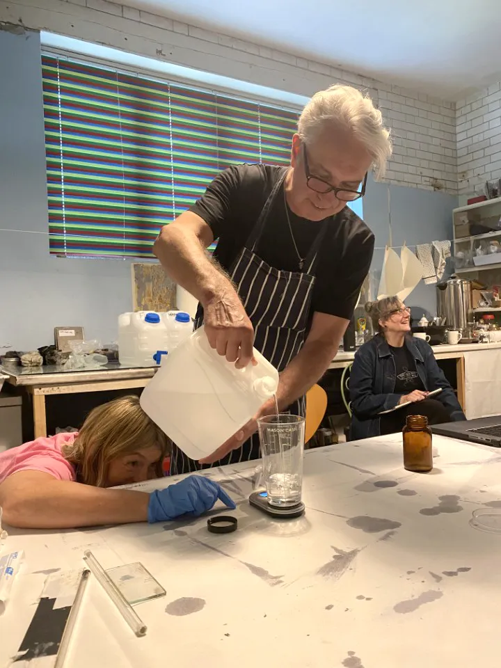 Ian Phillips-McLaren prepairing a salt printing workshop